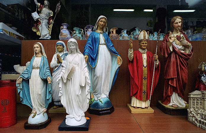 Religious souvenirs in a shop window near Saint Peter’s Basilica in Rome.