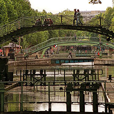 A long-distance view of locks and bridges over canal Saint-Martin.