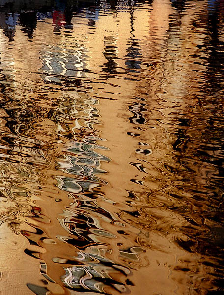 Buildings reflected in canal Saint-Martin.