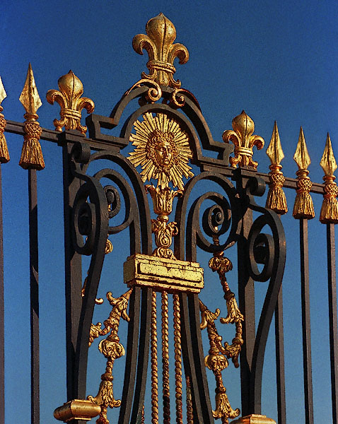 Golden ornamentation on the fence in front of château de Versailles.