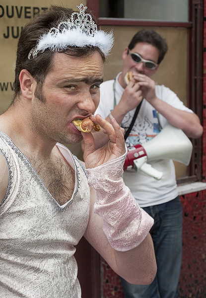 A young man participating in his stag party ritual outside on rue Vieille-du-Temple.