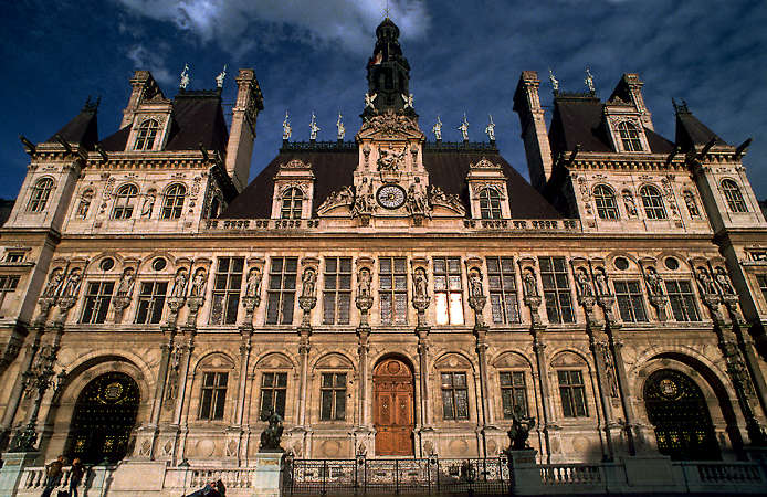 The main façade of Paris’ City Hall at sunset.