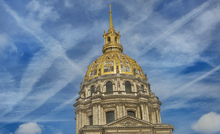The façade of Église Saint-Louis-des-Invalides’ dome seen from Rond-Point du Bleuet de France.