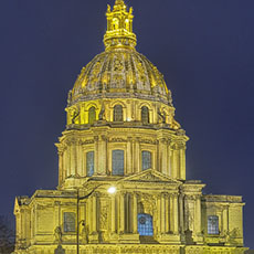 The southern side of Église Saint-Louis-des-Invalides’ dome at night.