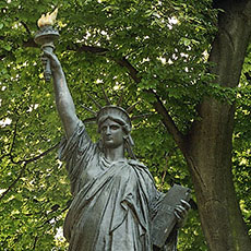 A bronze scale model of the Statue of Liberty in the Luxembourg Gardens.