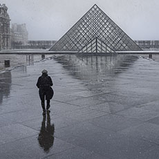 The Cour Napoléon in a snowstorm.