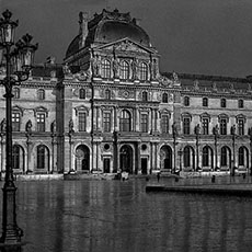 The sun shining just after a rainstorm in the Louvre Museum.
