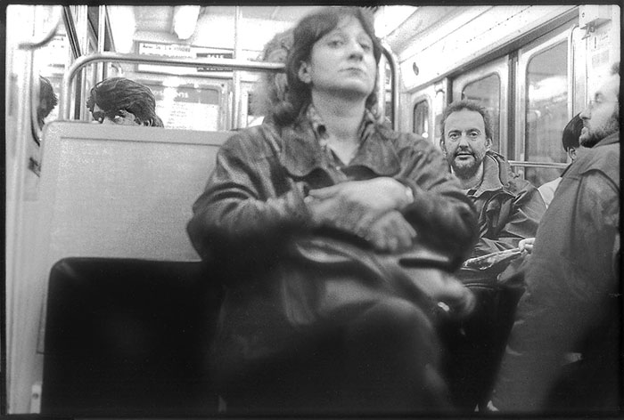 Camera-shy passengers on the métro in Paris.