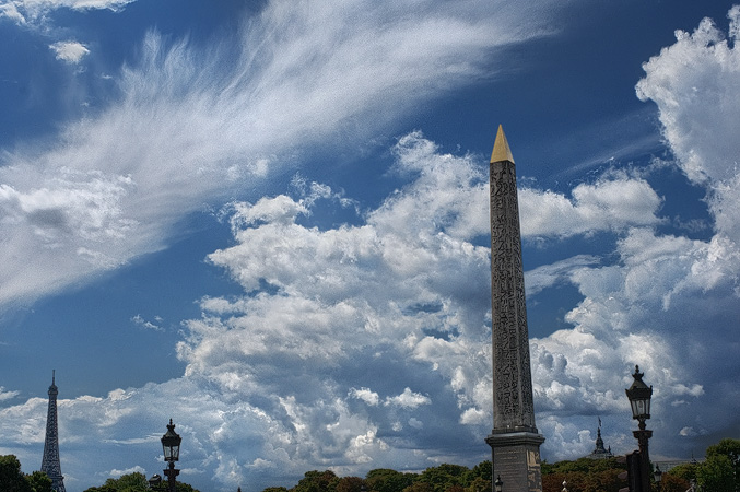 The Luxor Obelisk in place de la Concorde and the Eiffel Tower.
