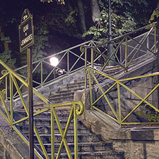 The stairs of Passerelle Bichat, a footbridge over canal Saint-Martin.