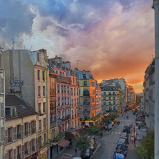 A sunset over rue des Abbesses in Montmartre.
