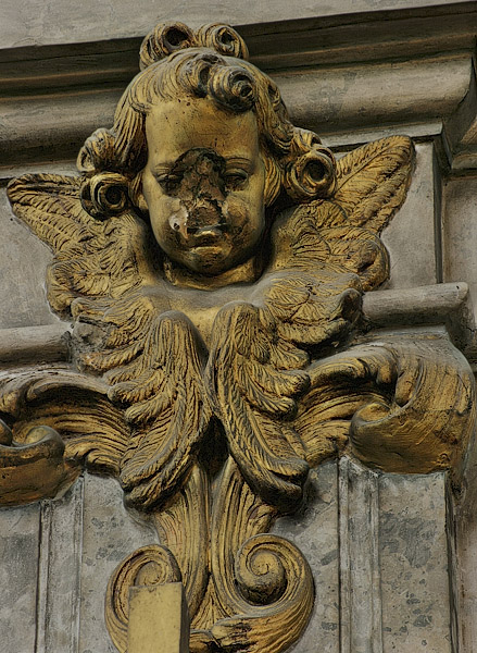 A sculpture of an angel with a broken face in Saint-Merry Church.