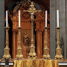 Six candle holders on the alter of Saint-Sulpice Church.