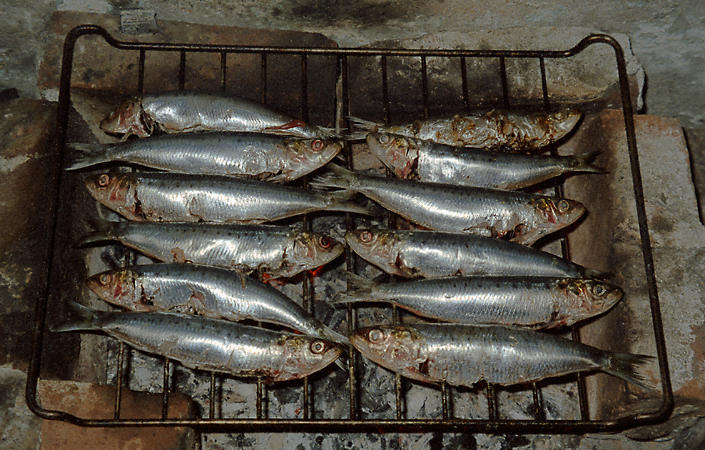 Sardines being cooked on a grill in Belleville.