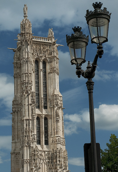 A classic Parisian streetlight and the western side of Tour Saint-Jacques.