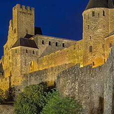 The Cité de Carcassonne’s porte de l’Aude at night.