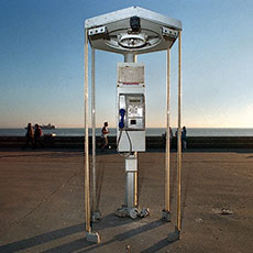 A shattered phone booth on the beachfront in Le Havre.