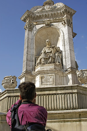 A photographer taking pictures in Paris.
