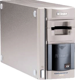 The Nikon Coolscan IV film scanner digitizes 35 mm negatives and slides at 2,900 DPI.