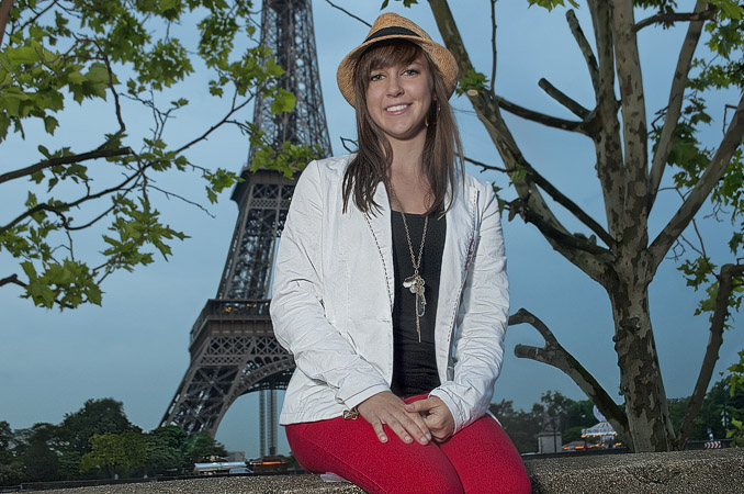 A portrait taken in front of the Eiffel Tower.