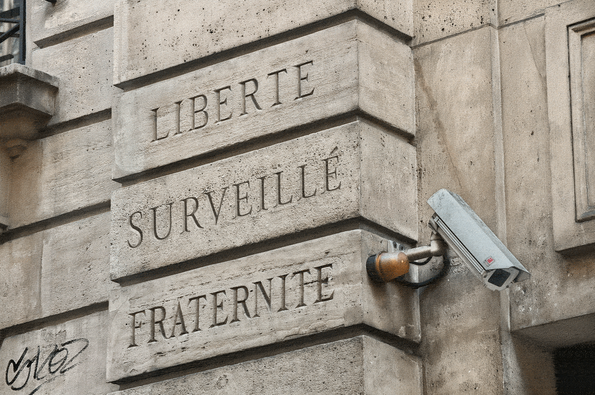 A video surveillance camera over an entrance to the Crédit Municipal bank in Paris.
