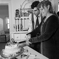 Edward Engel and Sue Hartke move in to wedding cake cutting mode