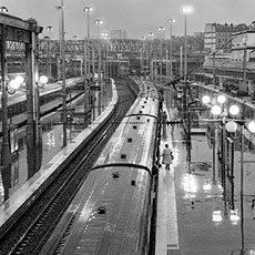 Train platforms at gare du Nord on a rainy day.