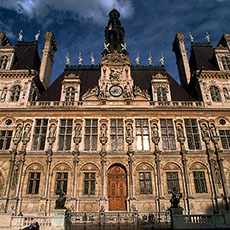 The main façade of Paris’ City Hall at sunset.