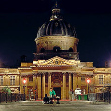 L’Institut de France and pont des Arts at night.