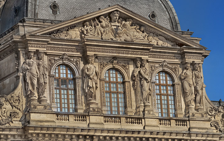 The central pediment at the top of the pavillon Sully.