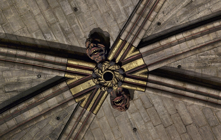 Sculptures of monsters on the ceiling of Notre-Dame cathedral.