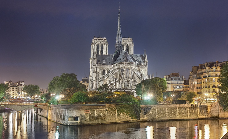 Notre-Dame Cathedral, quai de l’Archevêché, square de l’Île-de-France and Île de la Cité at night.