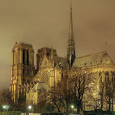 The south façade of Notre-Dame at sunset.