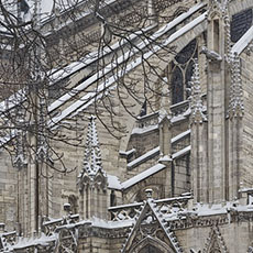 The south-western façade of Notre-Dame in a snow storm.