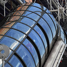 Plexiglas escalator tubes on the Pompidou Center’s façade.
