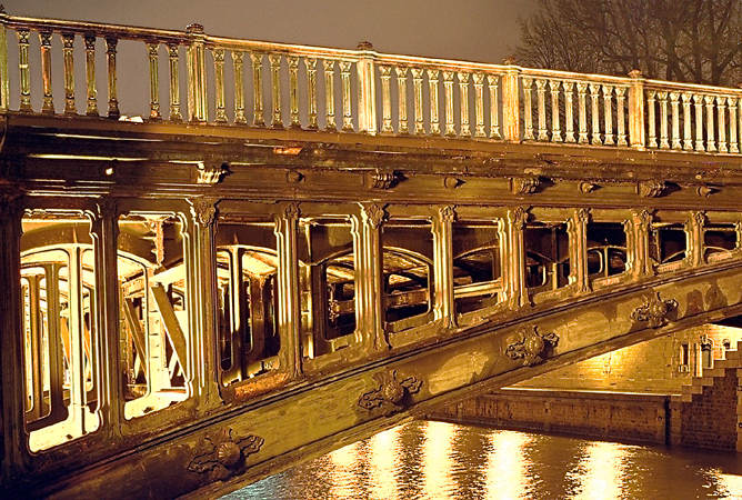 An interior view of pont d’Arcole’s framework at night.