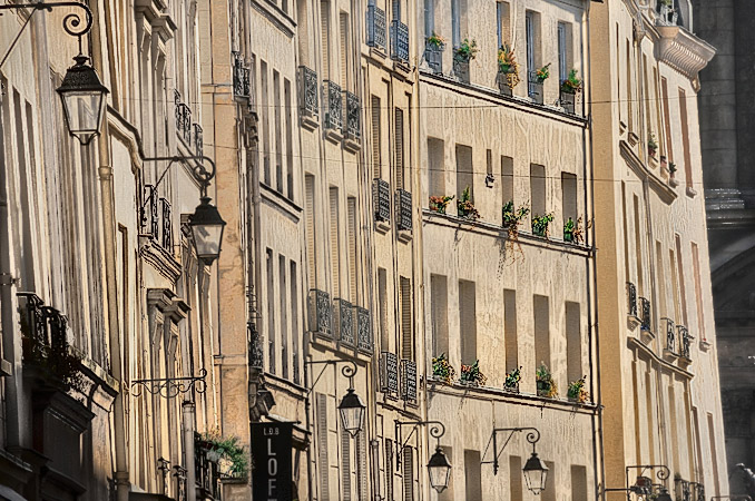 Building façades on the south-east side of rue de Sévigné,