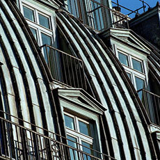 Windows on the top three floors at 9, rue de Castiglione.