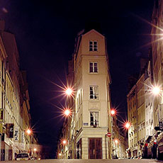 The corner of rue de Cléry and rue Beauregard at night.