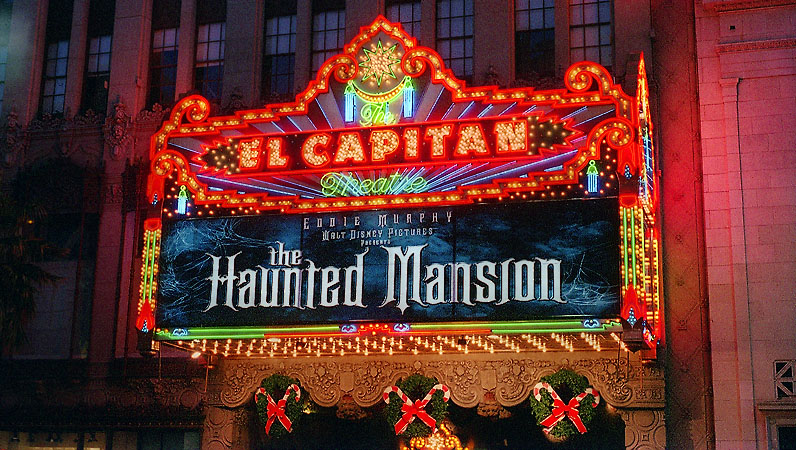 The El Capitan movie theater at night on Hollywood Boulevard in Los Angles.