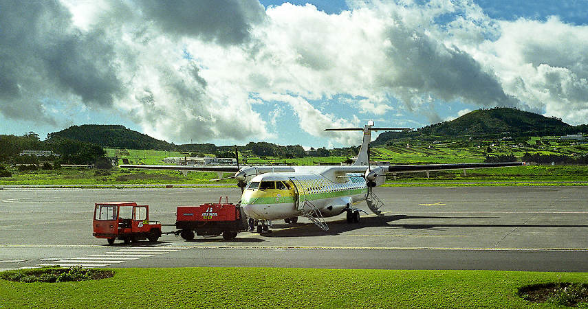 A turbo-prop plane refueling at the Tenerife airport.
