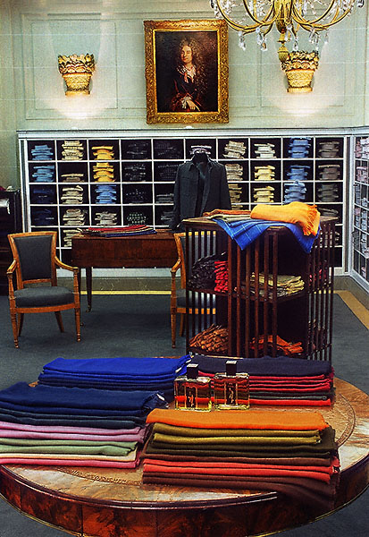 Scarves, shirts and jackets inside the Arnys clothing shop.