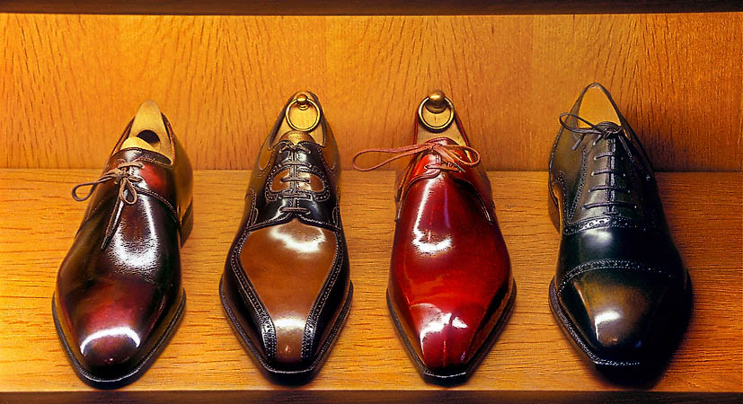 Four handmade shoes on display at the P. Corthay shop.
