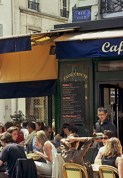Customers seated outside the Café du Marché on rue Cler.